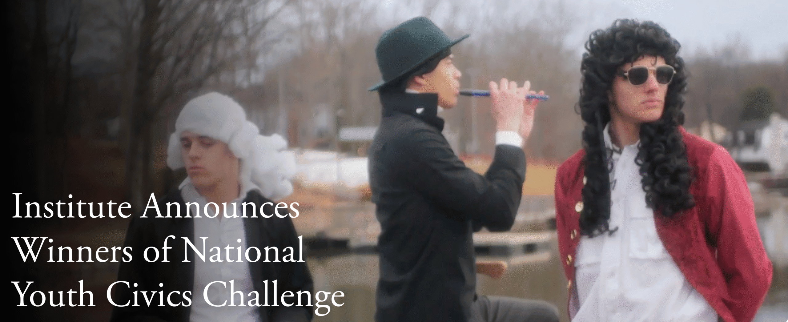 Three young people in historical costumes stand outdoors; one wears a white wig, another plays a flute in a green hat, and the third wears sunglasses and a curly black wig. Text reads, "Institute Announces Winners of National Youth Civics Challenge.
