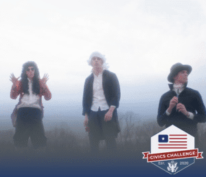 Three people dressed in historic colonial costumes stand outdoors under a cloudy sky. A Civics Challenge logo featuring an American flag and “Est. 2020” appears in the lower right corner.