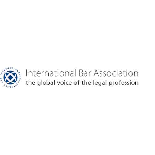 Logo of the International Bar Association with blue emblem on the left and text on the right reading 